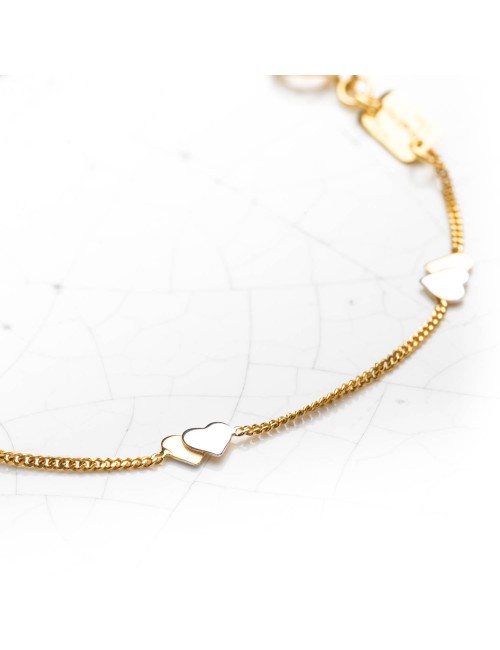Collier avec 6 doubles petits coeurs en Or bicolore