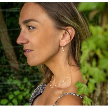 Boucle d'oreille femme en or 18 carats quatre perles d'eau douce.