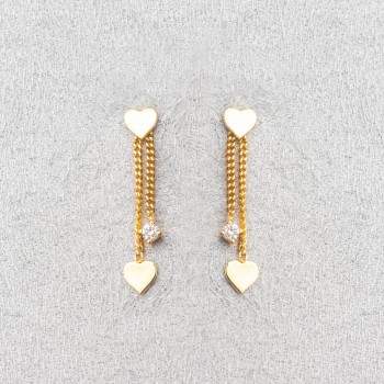 Boucle d'oreille femme double coeur et diamant de laboratoire.