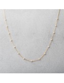 Collier femme orné de perle d'eau douce en 18 carats.
