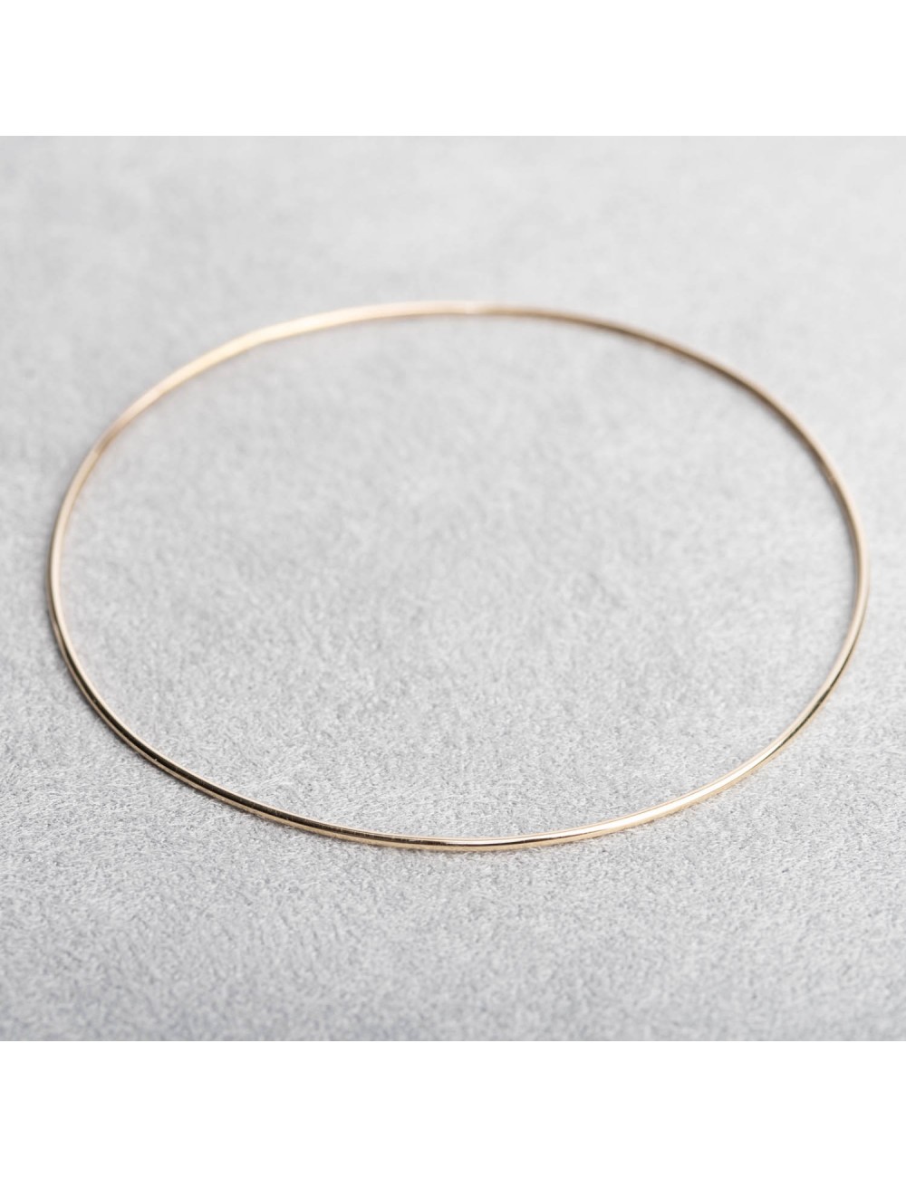 Bracelets femme fil rond rigide en or 9 carats.