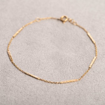 Bracelet femme fil grunge en or 9 carats.
