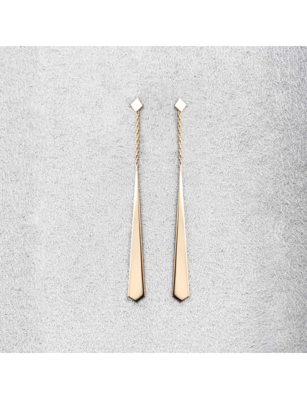 Boucle d'oreille femme cravate pendante 18 carats.