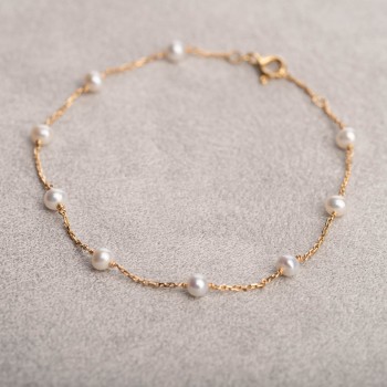 Bracelet femme neuf perles d'eau douce sur chaîne en or 18 carats.