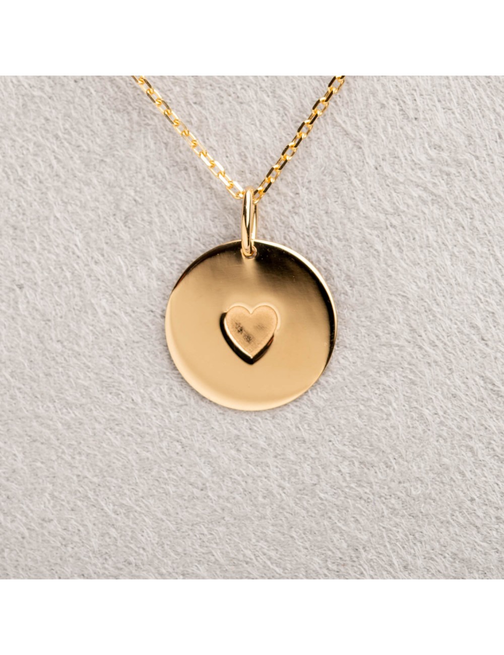 Pendentif motif coeur en or 18 carats.